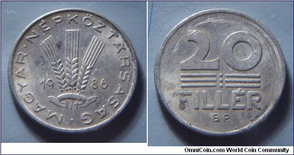 Hungarian People's Republic | 
20 Fillér, 1986 | 
20.3 mm, 0.95 gr. | 
Aluminium | 

Obverse: Three wheat stalks divides date | 
Lettering: • MAGYAR • NÉPKÖZTÁRSASÁG 1986 | 

Reverse: Denomination | 
Lettering: 20 FILLÉR |