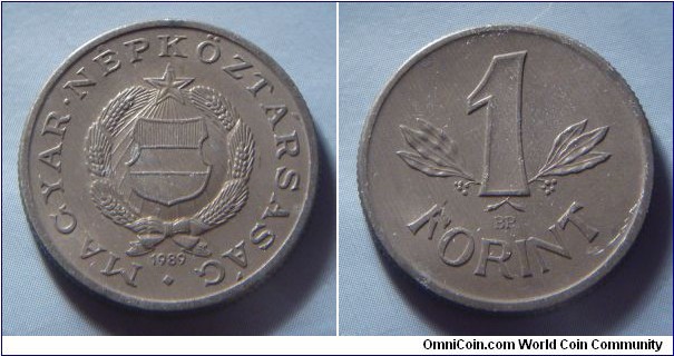 Hungarian People's Republic | 
1 Forint, 1989 | 
22.8 mm, 1.5 gr. | 
Aluminium | 

Obverse: National Coat of Arms, date below | 
Lettering: • MAGYAR • NÉPKÖZTÁRSASÁG 1989 | 

Reverse: Denomination | 
Lettering: 1 FORINT |