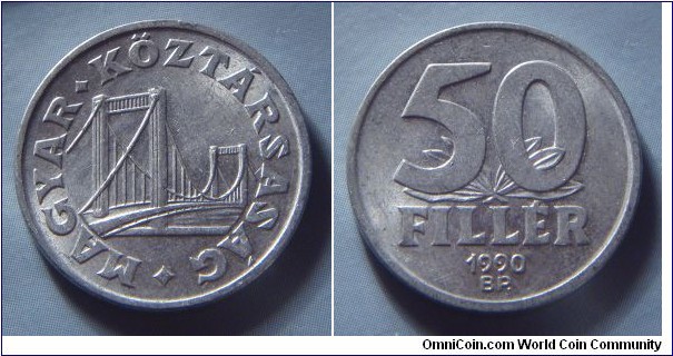 Hungary | 
50 Fillér, 1990 | 
21.5 mm, 1.25 gr. | 
Aluminium | 

Obverse: Elisabeth (Erzsébet) Bridge in Budapest | 
Lettering: • MAGYAR • KÖZTÁRSASÁG | 

Reverse: Denomination, date below | 
Lettering: 50 FILLÉR 1990 |