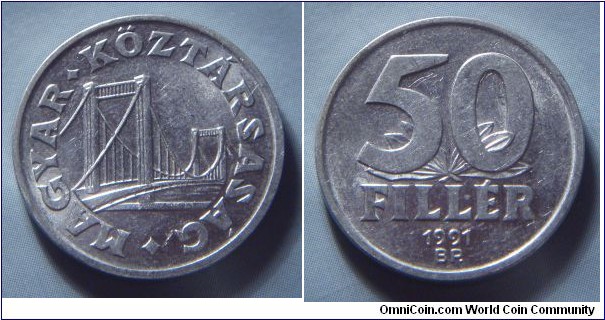 Hungary | 
50 Fillér, 1991 | 
21.5 mm, 1.25 gr. | 
Aluminium | 

Obverse: Elisabeth (Erzsébet) Bridge in Budapest | 
Lettering: • MAGYAR • KÖZTÁRSASÁG | 

Reverse: Denomination, date below | 
Lettering: 50 FILLÉR 1991 |