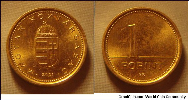 Hungary | 
1 Forint, 2001 | 
16.3 mm, 2.05 gr. | 
Nickel-brass | 

Obverse: National Coat of Arms, date below | 
Lettering: • MAGYAR KÖZTÁRSASÁG • 2001 | 

Reverse: Denomination | 
Lettering: 1 FORINT |