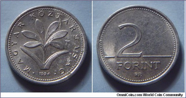 Hungary | 
2 Forint, 1994 | 
19 mm, 3.1 gr. | 
Copper-nickel | 

Obverse: The Hungarian crocus (Colchium Hungaricum), date below | 
Lettering: • MAGYAR KÖZTÁRSASÁG • 1994 | 

Reverse: Denomination | 
Lettering: 2 FORINT |