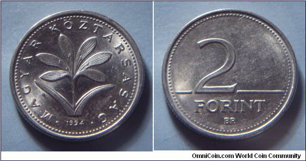 Hungary | 
2 Forint, 1994 | 
19 mm, 3.1 gr. | 
Copper-nickel | 

Obverse: The Hungarian crocus (Colchium Hungaricum), date below | 
Lettering: • MAGYAR KÖZTÁRSASÁG • 1994 | 

Reverse: Denomination | 
Lettering: 2 FORINT |
