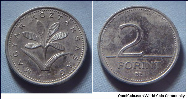 Hungary | 
2 Forint, 2006 | 
19 mm, 3.1 gr. | 
Copper-nickel | 

Obverse: The Hungarian crocus (Colchium Hungaricum), date below | 
Lettering: • MAGYAR KÖZTÁRSASÁG • 2006 | 

Reverse: Denomination | 
Lettering: 2 FORINT |
