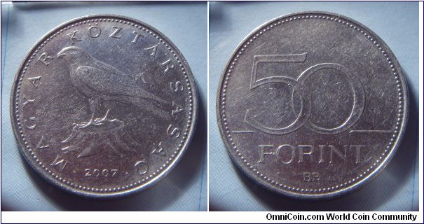 Hungary | 
50 Forint, 2007 | 
27.4 mm, 7.6 gr. | 
Copper-nickel | 

Obverse: Saker Falcon facing left, date below | 
Lettering: • MAGYAR KÖZTÁRSASÁG • 2007 | 

Reverse: Denomination | 
Lettering: 50 FORINT |