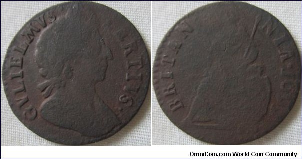 1699 farthing, date in legend, weakly struck.