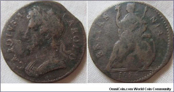1674 halfpenny, VF with clipped planchet and double struck.