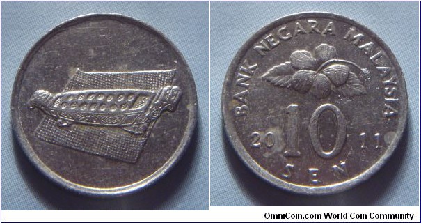 Malaysia | 
10 Sen, 2011 | 
19.4 mm, 1.82 gr. | 
Copper-nickel | 

Obverse: Congkak (Malay game) | 

Reverse: Flower blossom, denomination below divides date | 
Lettering: BANK NEGARA MALAYSIA 2011 10 SEN |