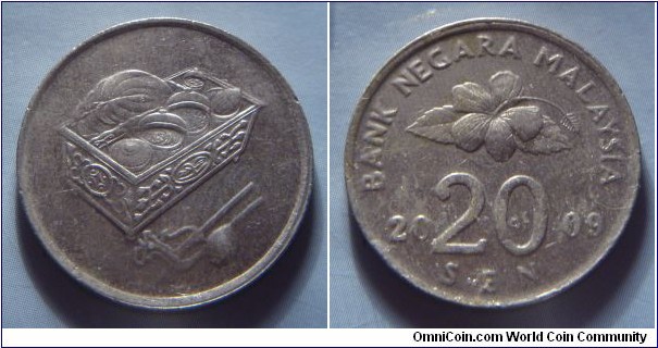 Malaysia | 
20 Sen, 2009 | 
23.57 mm, 5.69 gr. | 
Copper-nickel | 

Obverse: Sirih and Kapur container | 

Reverse: Flower blossom, denomination below divides date | 
Lettering: BANK NEGARA MALAYSIA 2009 20 SEN |