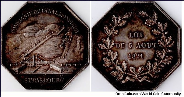 R2 silver jeton de presence struck for the french company `Compagnie du Canal Monsieur' a canal linking the Rhone and the Rhine. A rare jeton, especially in this toned but uncirculated condition.