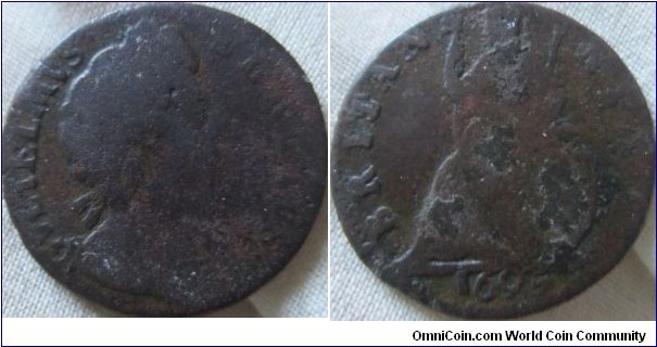1695 farthing, low grade but scarce.