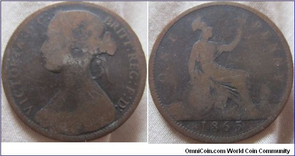 1865 penny in fair.