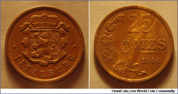 Luxembourg | 
25 Centimes, 1946 | 
19 mm, 2.5 gr. | 
Bronze | 

Obverse: National Coat of Arms | 
Lettering: • LETZEBURG • |

Reverse: Denomination, date below | 
Lettering: 25 CMES 1946 |