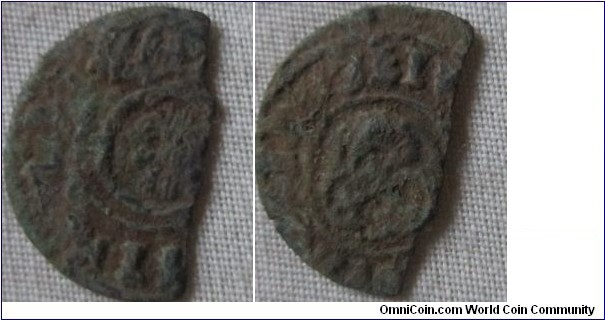 low grade solidus, cut in half, date unidentifiable