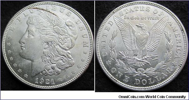 47Ag Morgan Silver Dollar. Silver has been used in coins since the electrum gold/silver alloy Lydian staters 2700 years ago. (JM17)