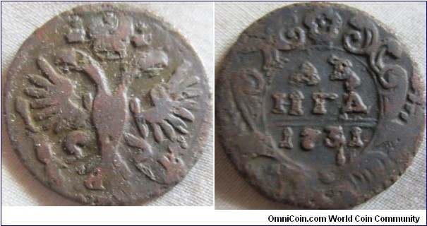 1731 denga overstruck on an earlier coin.