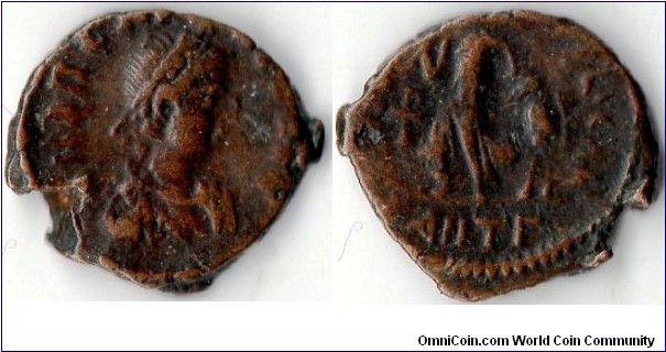 ae4 of the Roman Emperor Theodosius I (379-395 ad). Reverse: salus republicae -Victory advancing left dragging a captive.