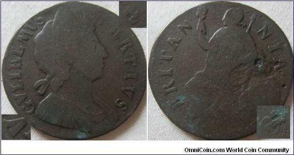 1697 (?) Halfpenny of William III, A in GVLIELMVS or filled V, B over V in BRITANNIA, and possibly E over H in TERTIVS (which is only listed under 1697, others are unlisted for these dies) although the copper colour could make it 1698