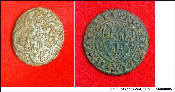 A complete struck copper alloy Medieval French jetton. It is circular, with a convex obverse. The obverse reads AVE MARIA GRACIAA in Lombardic script; in the field there is a shield with three fleur de lis, with three pellets on either side of the shield. There is a cross patte and a rosette in the obverse legend. The reverse has triple stranded straight cross fleuretty in four arched tressures, with what appears to be a flower with leaves in internal angles with four arched tressure