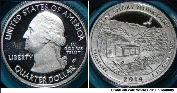 Great Smoky Mountains National Park, TN. America the Beautiful quarter program. Shows historic log cabins and rail fence found in the park.  A hawk soars above a mountain. 