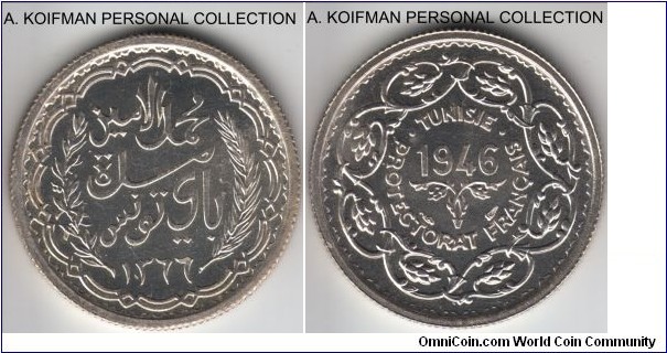 KM-X1, 1946 Tunisia 10 francs, Paris mint; silver, reeded edge, medallic rotation; earlier issue of this unusual series, mintage of 1,103 pieces.