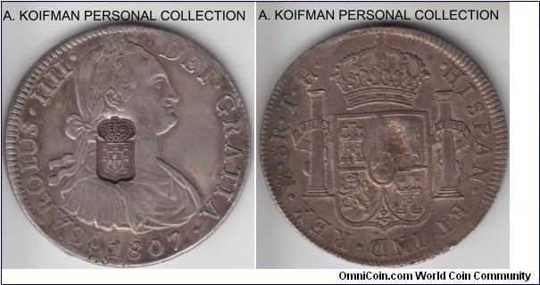 KM-440.13, (1834) Portugal 870 reis, shield countermark over KM-109 1807 Mexico 8R; silver, alternate circle and rectangle edge; extra fine host coin may be ex-jewelry which raises the question of the uncirculated c/m is counterfeit or it may be authentic as well.