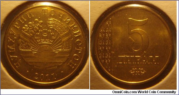 Tajikistan | 
5 Diram, 2011 | 
18 mm, 2 gr. | 
Brass plated Steel | 

Obverse: National Coat of Arms, date below | 
Lettering: • ҶУМҲУРИИ ТОҶИКИСТОН • 2011 | 

Reverse: Ornament, denomination right | 
Lettering: 5 ДИРАМ |