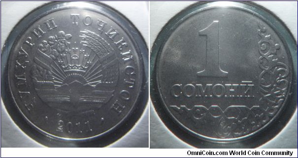 Tajikistan | 
1 Somonii, 2011 | 
27 mm, 5.2 gr. | 
Stainless Steel clad Iron | 

Obverse: National Coat of Arms, date below | 
Lettering: • ҶУМҲУРИИ ТОҶИКИСТОН • 2011 |

Reverse: Ornament, denomination left | 
Lettering: 1 СОМОНӢ  |