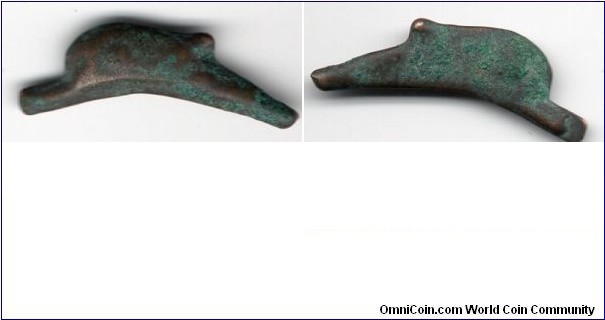 Olbia - Sarmatia Black Sea Area
550 - 525bc
Olbian Dolphin bronze coin. 
Length 23,9 millimeters.
Weight 1,1 grams. 
modern day Ukraine
