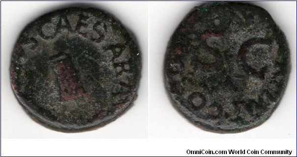 Claudius 41-54AD 
AE Quadrans. 
TI CLAVDIVS CAESAR AVG around modius
PON M TR P IMP COS DES IT around large SC.  Possibly minted in Spain or Gaul.