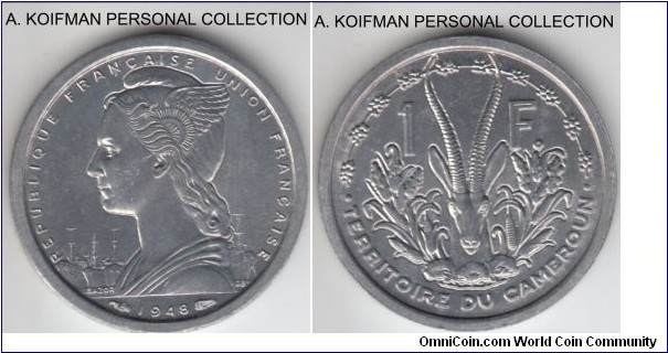 KM-8, 1948 Cameroon franc; aluminum, plain edge; nice coin with the common gazelle motif so popular in African coins, brilliant uncirculated, spots on the Liberty's cheek are toning, not scratches.