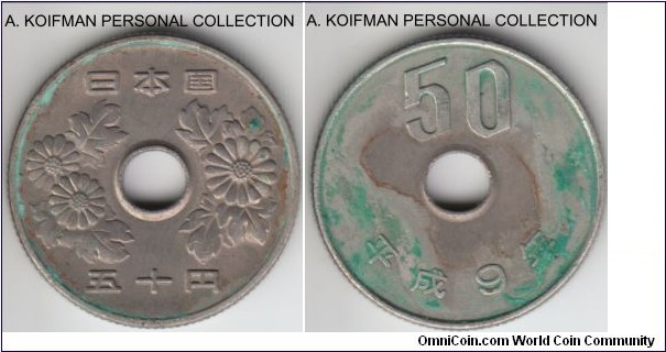 Y#101.2, Yr.9 (1997) Japan 50 yen; copper-nickel, reeded edge; extra fine details, stain and spot on reverse.