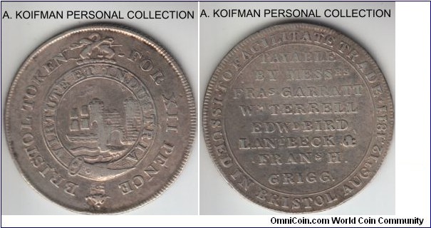 Great Britain shilling token; silver, diagonally milled edge; Bristol, very fine, slightly bent.