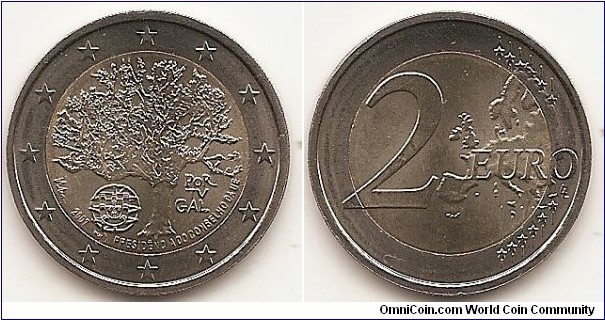 2 Euro
KM#772
8.5000 g., Bi-Metallic Nickel-Brass center in Copper-Nickel ring, 25.75 mm. Subject: Portuguese Presidency of the Council of the European Union. Obv: The inner part of the coin shows a cork oak (Quercus suber) taking up most of the coin's design; under the branches, on the left hand side, is the coat of arms of Portugal and on the right hand side the word POR TU GAL written over three lines. The inscription 2007 PRESIDÊNCIA DO CONSELHO DA UE is written in a semicircle along the bottom of the inner part, with the artist's signature on the right and the mint mark near the coat of arms. The twelve stars of the European Union surround the design on the outer ring of the coin. Rev: 2 on the left-hand side, six straight lines run vertically between the lower and upper right-hand side of the face, 12 stars are superimposed on these lines, one just before the two ends of each line, superimposed on the mid - and upper section of these lines; the European continent ( extended ) is represented on the right-hand side of the face; the right-hand part of the representation is superimposed on the mid-section of the lines; the word ‘EURO’ is superimposed horizontally across the middle of the right-hand side of the face. Under the ‘O’ of EURO, the initials ‘LL’ of the engraver appear near the right-hand edge of the coin. Edge: Reeded with Five coats of arms and seven castles equally spaced. Obv. designer: Maria Irene Vilar Rev. designer: Luc Luycx