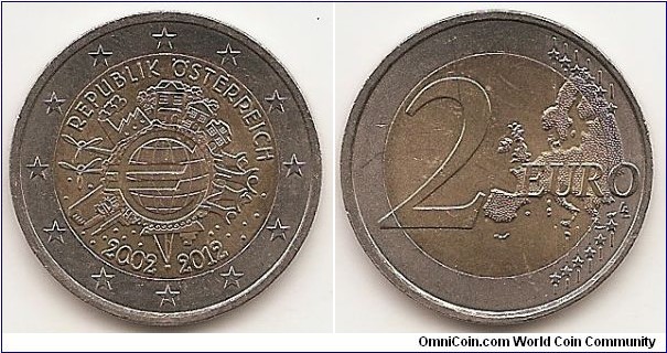 2 Euro
KM#3205
8.5000 g., Bi-Metallic Nickel-Brass center in Copper-Nickel ring, 25.75 mm. Subject : Euro Coinage, 10th Anniversary Obv: The inner part of the coin features the world in the form of a euro symbol in the centre, showing how the euro has become a true global player over the last ten years. The surrounding elements symbolise the importance of the euro to ordinary people (represented by a family group and houses), to the financial world (the Eurotower), to trade (a ship), to industry (a factory), and to the energy sector and research and development (two wind turbines). The designer’s initials, “A.H.”, can be found between the ship and the Eurotower. Along the upper and lower edges of the inner part of the coin are, respectively, the country of issue REPUBLIK ÖSTERREICH and the years “2002 – 2012”. The twelve stars of the European Union surround the design on the outer ring of the coin. Rev: 2 on the left-hand side, six straight lines run vertically between the lower and upper right-hand side of the face, 12 stars are superimposed on these lines, one just before the two ends of each line, superimposed on the mid - and upper section of these lines; the European continent ( extended ) is represented on the right-hand side of the face; the right-hand part of the representation is superimposed on the mid-section of the lines; the word ‘EURO’ is superimposed horizontally across the middle of the right-hand side of the face. Under the ‘O’ of EURO, the initials ‘LL’ of the engraver appear near the right-hand edge of the coin. Edge: Reeded with 2 EURO ***, repeated four times, alternately upright and inverted. Obv. designer: Helmut Andexlinger Rev. designer: Luc Luycx