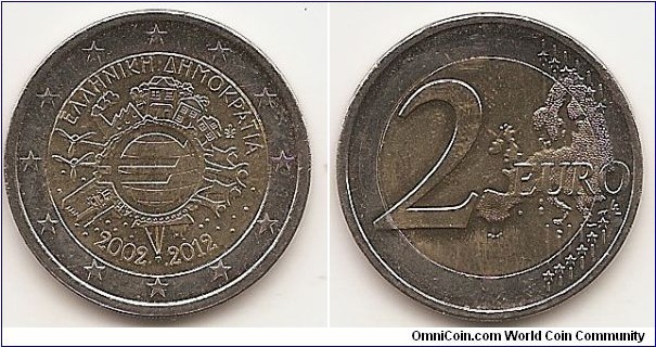 2 Euro
KM#245
8.5000 g., Bi-Metallic Nickel-Brass center in Copper-Nickel ring, 25.75 mm. Subject : Euro Coinage, 10th Anniversary Obv: The inner part of the coin features the world in the form of a euro symbol in the centre, showing how the euro has become a true global player over the last ten years. The surrounding elements symbolise the importance of the euro to ordinary people (represented by a family group and houses), to the financial world (the Eurotower), to trade (a ship), to industry (a factory), and to the energy sector and research and development (two wind turbines). The designer’s initials, “A.H.”, can be found between the ship and the Eurotower. Along the upper and lower edges of the inner part of the coin are, respectively, the country of issue ΕΛΛΗΝΙΚΗ ΔΗΜΟΚΡΑΤΙΑ and the years “2002 – 2012”. The mint mark appear on the right side by homes. The twelve stars of the European Union surround the design on the outer ring of the coin. Rev: 2 on the left-hand side, six straight lines run vertically between the lower and upper right-hand side of the face, 12 stars are superimposed on these lines, one just before the two ends of each line, superimposed on the mid - and upper section of these lines; the European continent ( extended ) is represented on the right-hand side of the face; the right-hand part of the representation is superimposed on the mid-section of the lines; the word ‘EURO’ is superimposed horizontally across the middle of the right-hand side of the face. Under the ‘O’ of EURO, the initials ‘LL’ of the engraver appear near the right-hand edge of the coin. Edge: Reeded with EΛΛHNIKH ΔHMOKPATIA. Obv. designer: Helmut Andexlinger Rev. designer: Luc Luycx