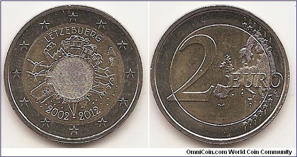2 Euro
KM#119
8.5000 g., Bi-Metallic Nickel-Brass center in Copper-Nickel ring, 25.75 mm. Subject : Euro Coinage, 10th Anniversary Obv: The inner part of the coin features the world in the form of a euro symbol in the centre, showing how the euro has become a true global player over the last ten years. The surrounding elements symbolise the importance of the euro to ordinary people (represented by a family group and houses), to the financial world (the Eurotower), to trade (a ship), to industry (a factory), and to the energy sector and research and development (two wind turbines). The designer’s initials, “A.H.”, can be found between the ship and the Eurotower. Along the upper and lower edges of the inner part of the coin are, respectively, the country of issue LËTZEBUER. As with the previous common commemorative coins, an obligatory latent image of Grand Duke Henri was added to the Luxembourgish edition. The portrait is located in the same space as the euro sign and the surrounding globe. and the years “2002 – 2012”. The mint marks appear on the right side by homes. The twelve stars of the European Union surround the design on the outer ring of the coin. Rev: 2 on the left-hand side, six straight lines run vertically between the lower and upper right-hand side of the face, 12 stars are superimposed on these lines, one just before the two ends of each line, superimposed on the mid - and upper section of these lines; the European continent ( extended ) is represented on the right-hand side of the face; the right-hand part of the representation is superimposed on the mid-section of the lines; the word ‘EURO’ is superimposed horizontally across the middle of the right-hand side of the face. Under the ‘O’ of EURO, the initials ‘LL’ of the engraver appear near the right-hand edge of the coin. Edge: Reeded with 2 * *, repeated six times, alternately upright and inverted. Obv. designer: Helmut Andexlinger Rev. designer: Luc Luycx