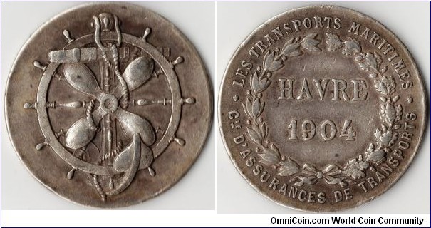 silver jeton struck for The `Havre'- Transports Maritimes' a french maritime assurer that was unsurprisingly based in Le Havre. No longer in existence. Very three dimensional obverse, flat as a pancake reverse.
