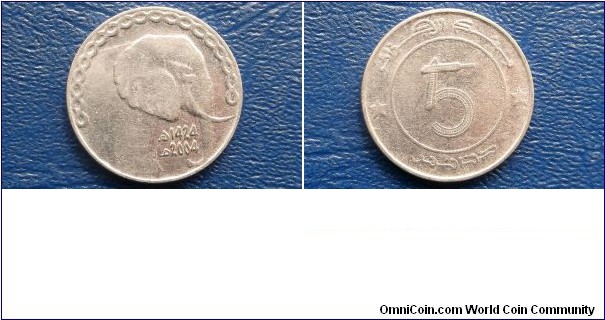 Algeria 5 Dinars KM# 123     1413-1992-AH1424-2004
Specifications

Composition: Stainless Steel

Weight: 6.2000g

Diameter: 24.5mm
Design

Obverse: Denomination within circle

Reverse: Forepart of African elephant right

Edge Description: Plain