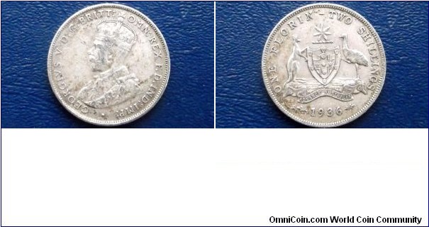 Australia Florin KM# 27     1911-1936

Specifications

Composition: Silver

Fineness: 0.9250

Weight: 11.3100g

ASW: 0.3363oz

Diameter: 28.5mm
Design

Obverse: Crowned bust left

Obverse Designer: E. B. Mackennal

Reverse: Arms

Reverse Designer: W. H. J. Blakemore

Edge Description: Reeded
Notes

Ruler: George V

