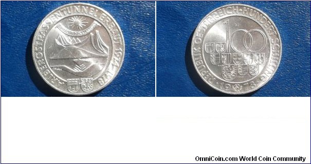 SILVER 1978 AUSTRIA 100 SHILLINGS CHOICE BU OPENING OF ARLBERG TUNNEL

Specifications

Composition: Silver

Fineness: 0.6400

Weight: 24.0000g

ASW: 0.4938oz

Diameter: 36mm
Design

Obverse: Value and three rows of shields within circle, date below circle divided by small hammer and sickle emblem

Reverse: Sun above banner, mountains below, hands in front of mountains, circle surrounds all, two dates in legend, two shields below circle

Edge Description: Plain with engraved lettering
Notes

Subject: Opening of Arlberg Tunnel