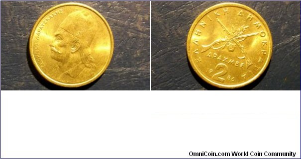 1986 Greece 2 Drachmes Crossed Rifles KM#130 Very Nice BU Coin Go Here:

http://stores.ebay.com/Mt-Hood-Coins

