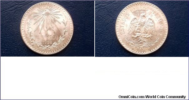 .720 Silver 1938 Mexico Peso KM#455 Cap & Rays Type Nice Gem BU Coin Go Here:

http://stores.ebay.com/Mt-Hood-Coins