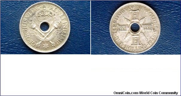 .925 Sterling Silver 1945 New Guinea 1 Shilling Coin:
Last Year of This Issue
23.5mm - Holed Type
Very Nice Toned Circulated Go Here:

http://stores.ebay.com/Mt-Hood-Coins

SOLD !!!