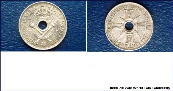 .925 Sterling Silver 1945 New Guinea 1 Shilling Coin:
Last Year of This Issue
23.5mm - Holed Type
Very Nice Toned Circulated Go Here:

http://stores.ebay.com/Mt-Hood-Coins

SOLD !!!