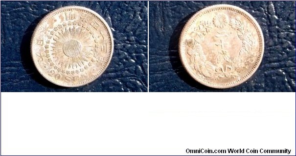 .800 Silver Year 43 1910 Japan 20 Sen Y# 30 Dragon Sunburst Type Nice Toned 
Go Here:

http://stores.ebay.com/Mt-Hood-Coins