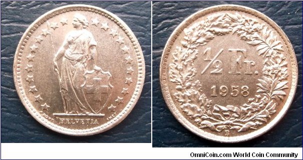 Silver 1958-B Switzerland 1/2 Franc Standing Helvetia Lance High Grade Go Here:

http://stores.ebay.com/Mt-Hood-Coins