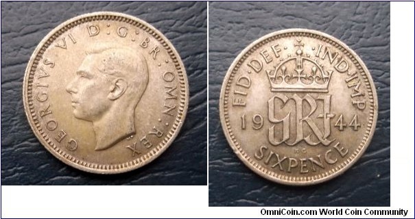 Silver 1944 Great Britain 6 Pence George VI KM# 852 Very Nice Toned Circ Go Here:

http://stores.ebay.com/Mt-Hood-Coins

