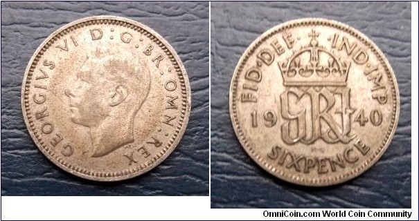 Silver 1940 Great Britain 6 Pence George VI KM# 852 Nice Toned Circ Go Here:

http://stores.ebay.com/Mt-Hood-Coins
