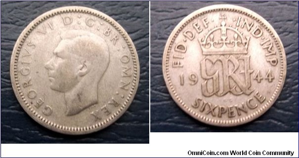 Silver 1944 Great Britain 6 Pence George VI KM# 852 Nice Toned Circ Go Here:

http://stores.ebay.com/Mt-Hood-Coins
